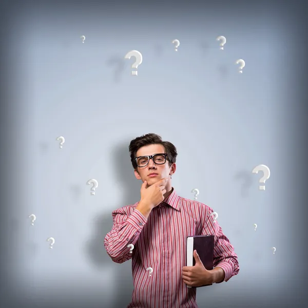 Young man scientist with glasses thinking — Stock Photo, Image