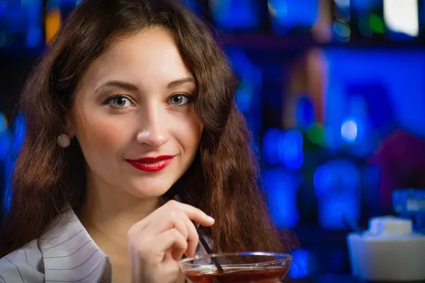 Young woman in a bar Stock Photo