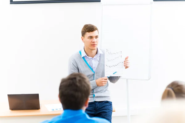 Teacher talking with students — Stock Photo, Image