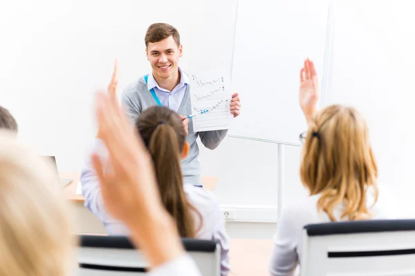 Teacher talking with students — Stock Photo, Image