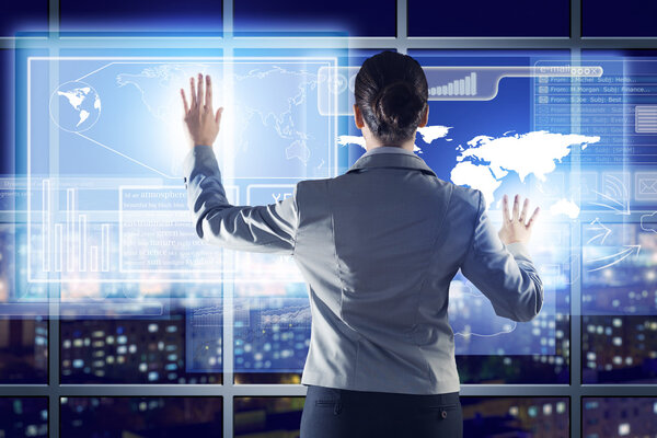 businesswoman working with virtual technologies