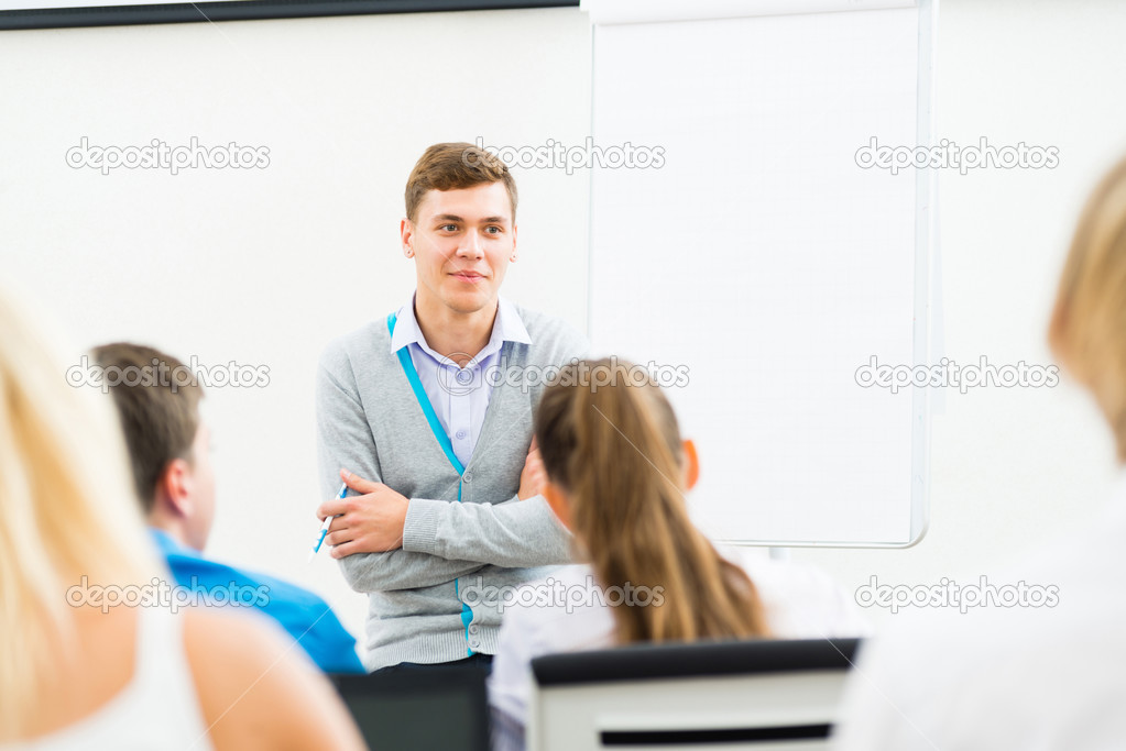 teacher talking with students