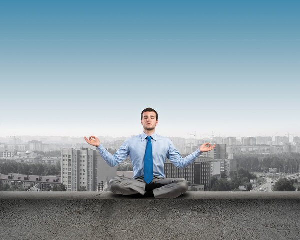 Businessman meditating