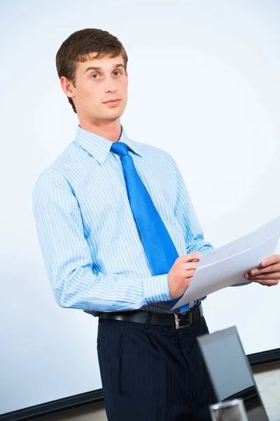 Business man with business papers — Stock Photo, Image
