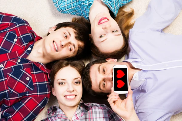 Man pressed his lips to the phone — Stock Photo, Image