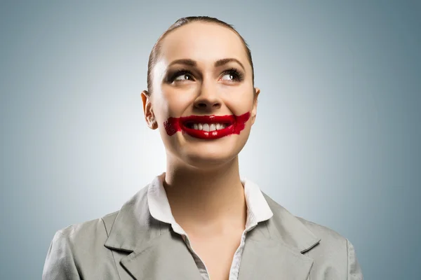 Mujer joven con la boca roja vívida —  Fotos de Stock