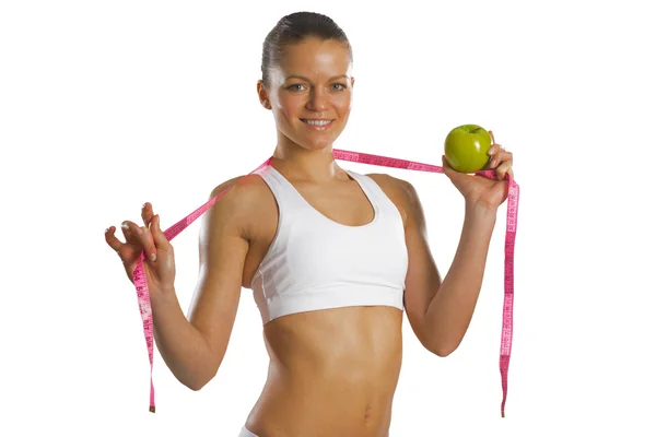 Young attractive woman with measuring tape — Stock Photo, Image