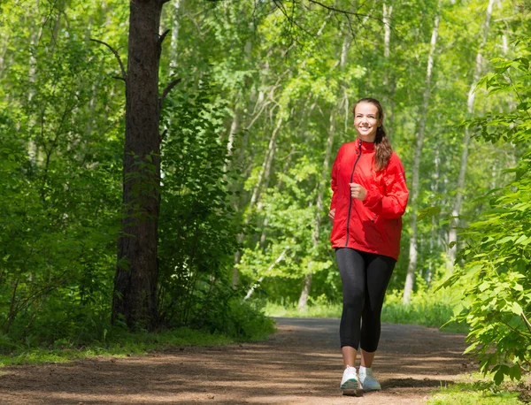 Healthy young female athlete running — Stock Photo, Image