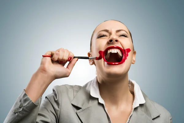 Young woman with vivid red mouth — Stock Photo, Image