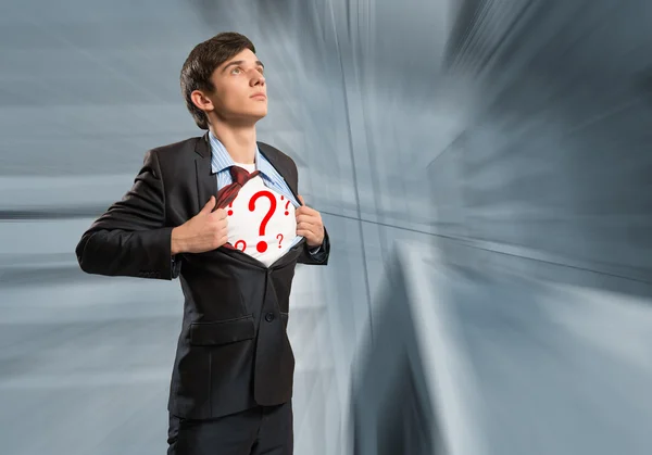 Businessman breaks the shirt — Stock Photo, Image