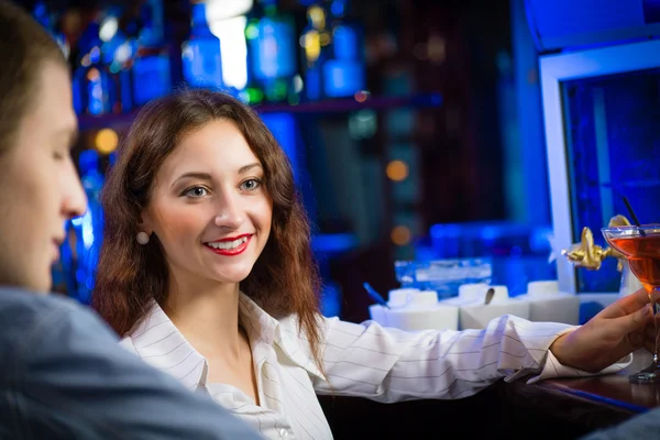 Young woman in a bar — Stock Photo, Image