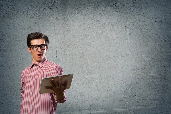 Young man with tablet — Stock Photo, Image