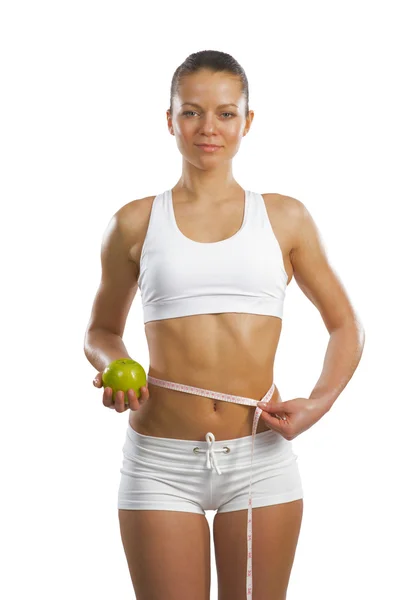 Young attractive woman with measuring tape — Stock Photo, Image