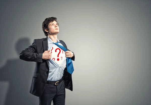 Businessman breaks the shirt — Stock Photo, Image