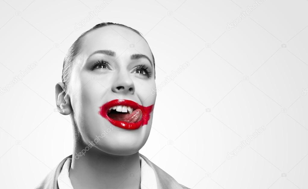 Conceptual Image with Vivid Red Mouth