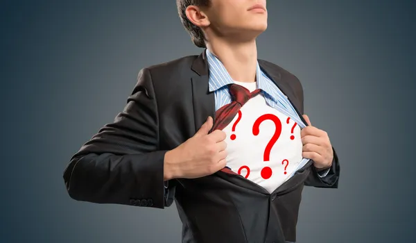 Businessman breaks the shirt — Stock Photo, Image