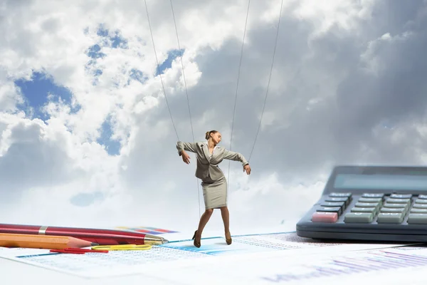 Businesswoman puppet doll is on the desk — Stock Photo, Image