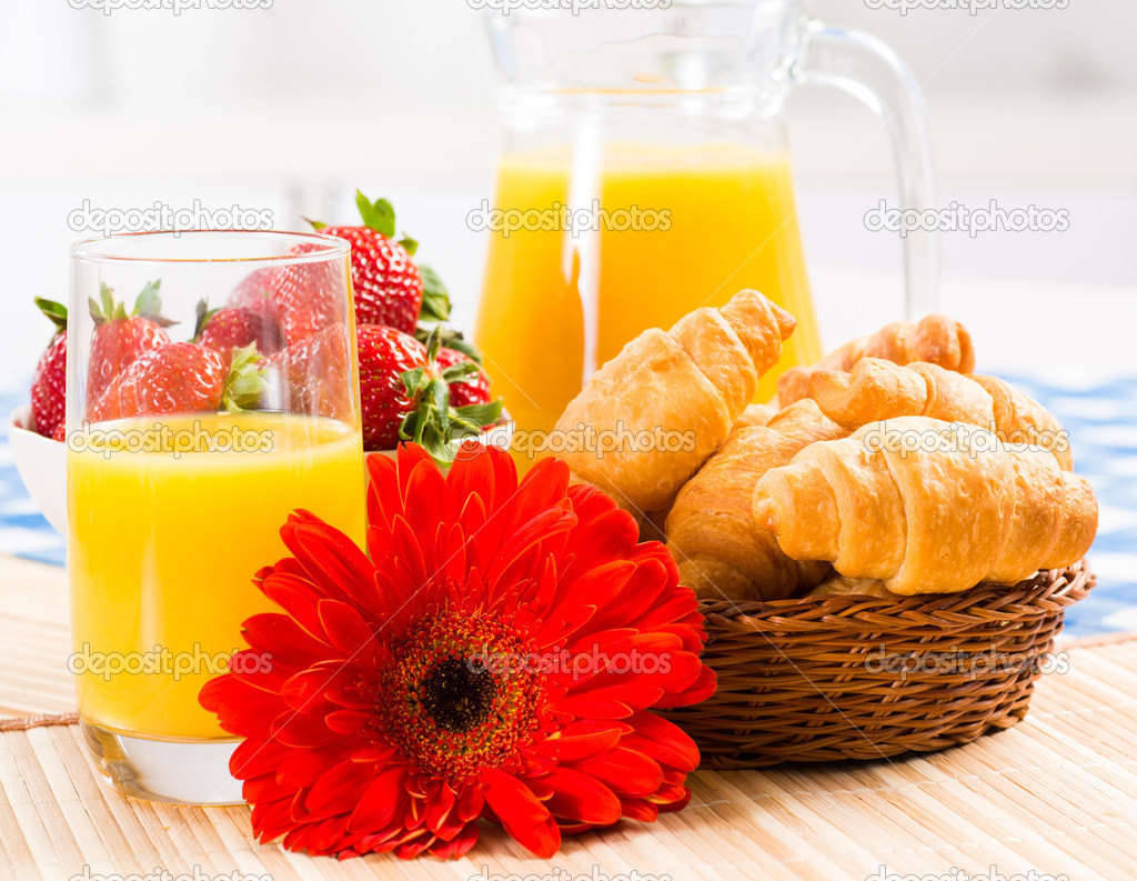 early breakfast, juice, croissants and Berries