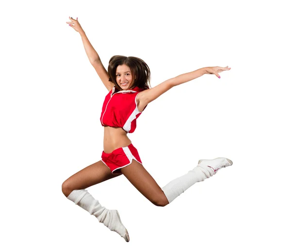 Athletic young woman jumping — Stock fotografie