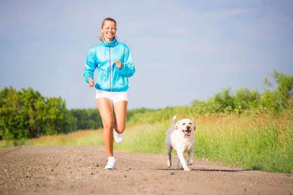 Young woman running — Stock Photo, Image