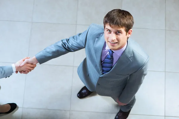 Portrait of a businessman shaking hand — Stock Photo, Image