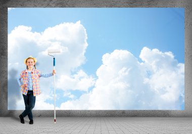 boyama için bir rulo ile şapkalı kız