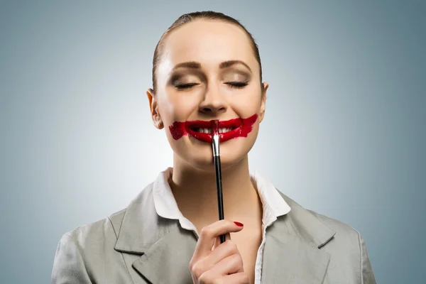 Young woman with vivid red mouth — Stock Photo, Image