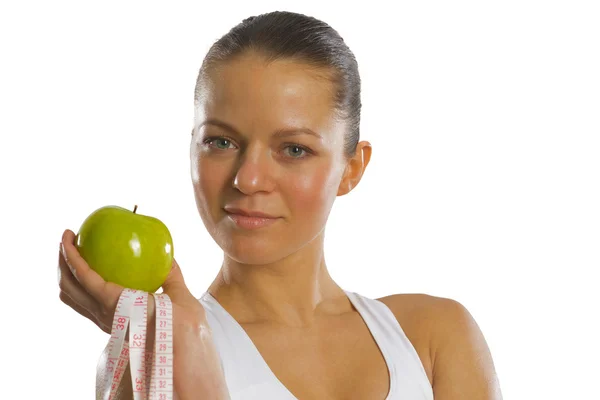 Young attractive woman with measuring tape — Stock Photo, Image