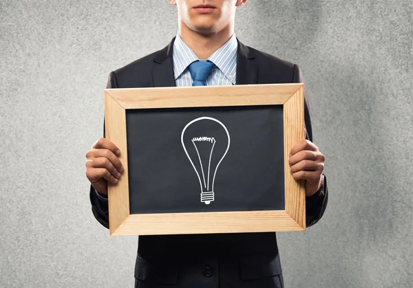 Businessman with frame — Stock Photo, Image