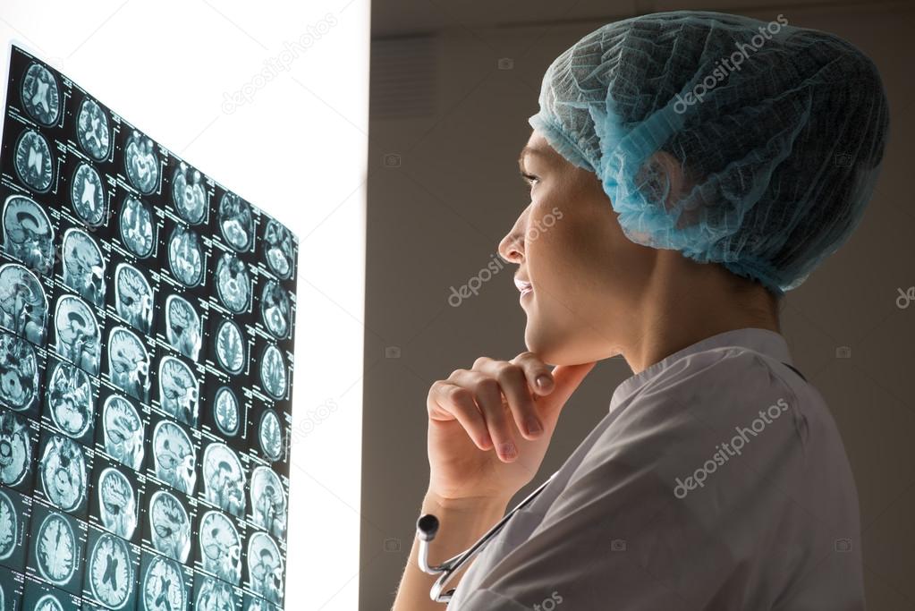 doctor looking at the x-ray