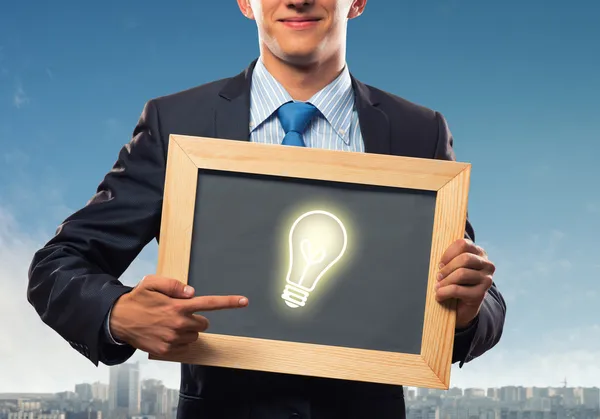 Businessman with frame — Stock Photo, Image