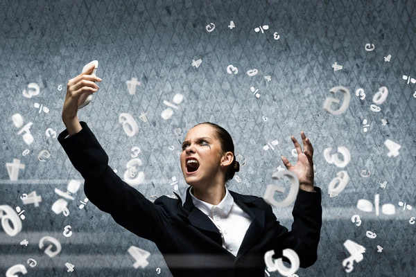 Businesswoman screaming in mobile phone — Stock Photo, Image