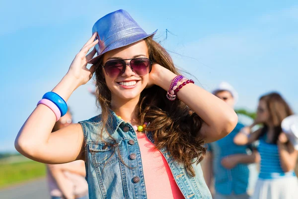 Stylish young woman in sunglasses — Stock Photo, Image