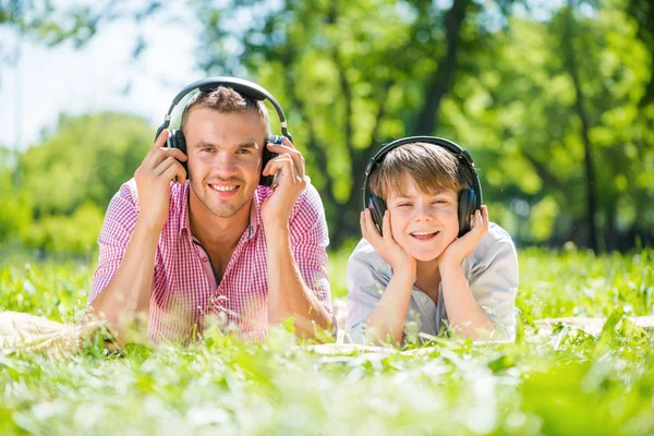 Father and son in park — Stock Photo, Image