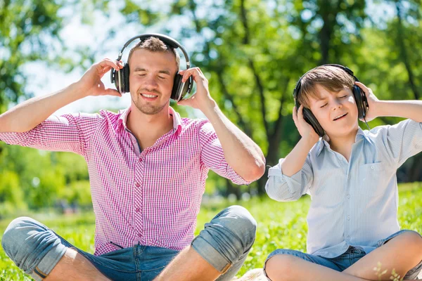 Father and son in park — Stock Photo, Image