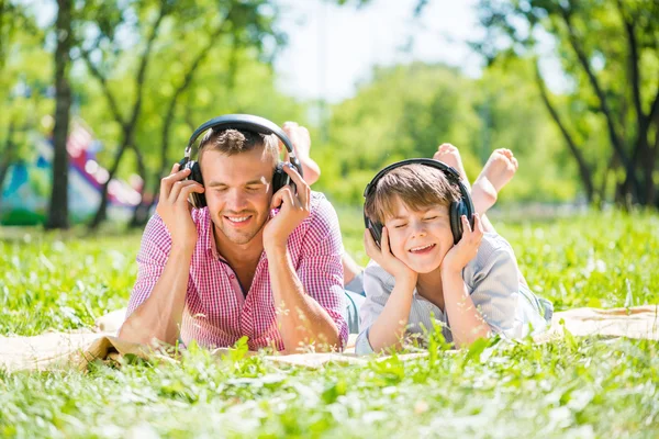 Father and son in park — Stock Photo, Image