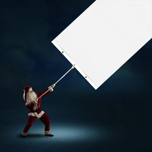 Babbo Natale tira lo striscione — Foto Stock