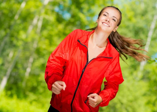 Jonge vrouwelijke atleet uitgevoerd — Stockfoto