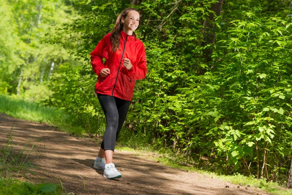 Giovane atleta donna in corsa — Foto Stock