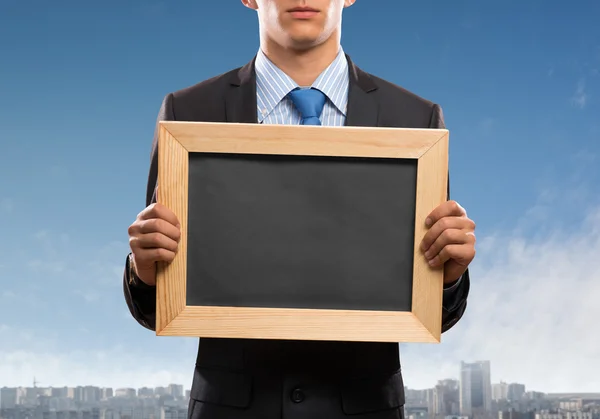 Businessman with frame — Stock Photo, Image