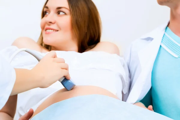 Hands and abdominal ultrasound scanner — Stock Image Hands and abdominal ultrasound scanner Stock Image
