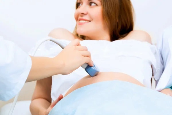 Hands and abdominal ultrasound scanner — Stock Image Hands and abdominal ultrasound scanner Stock Photo