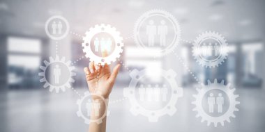 Takım çalışması konsepti ve zarif modern iç mekandaki kişinin jestini seçmek