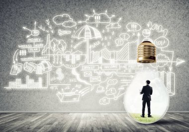 Ampulde sıkışan bir iş adamı