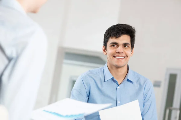 Portrait of a young man at a business meeting — Stock Photo, Image