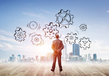 Ekip çalışması ve işbirliği sembolü olarak ekranda çarklı motor çizildi