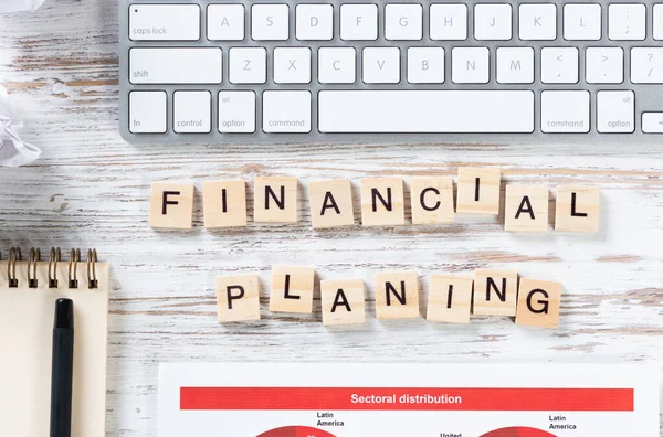 stock image Financial planning concept with letters on cubes