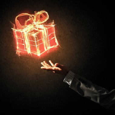 Alev alev yanan hediye sembolü ve iş adamı palmiyesiyle kutlama kavramı