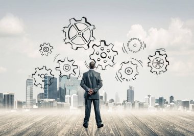 Ekip çalışması ve işbirliği sembolü olarak ekranda çarklı motor çizildi