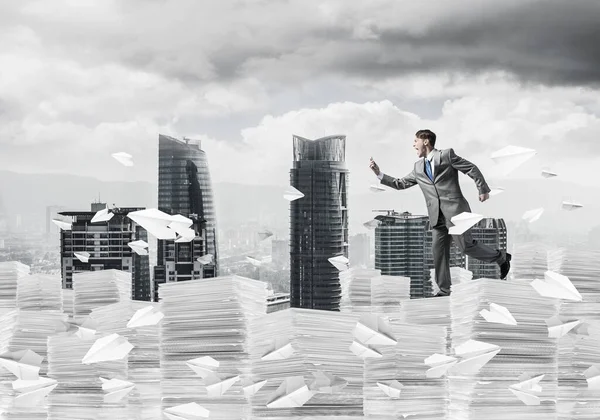 Precise businessman in suit running with phone. — Stock Photo, Image